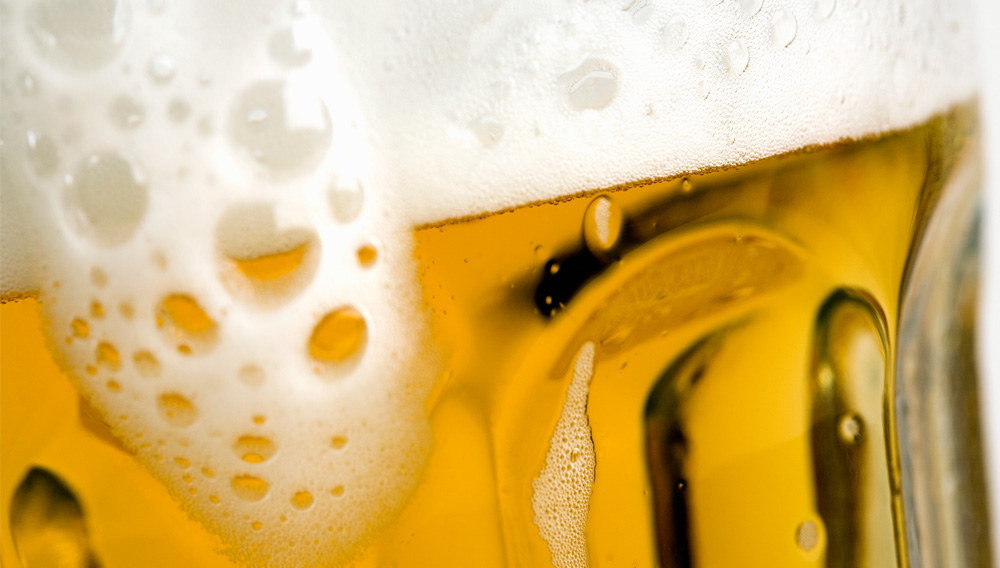 Close up of beer glass with foam (Foto: Getty Images)