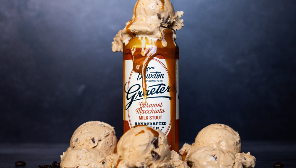 Bottle of Braxton Brewing Company’s Milk Stout, garnished with four scoops of icecream (Source: Joint Braxton Brewing Co./Graeter’s Press Release)