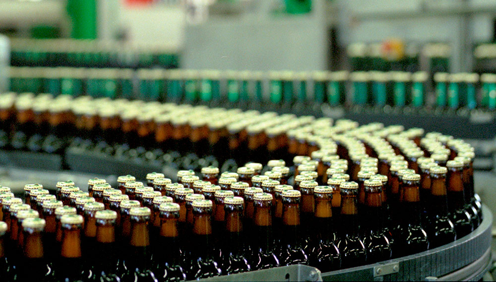 Beer bottles in a bottle filler (Photo: DBB)