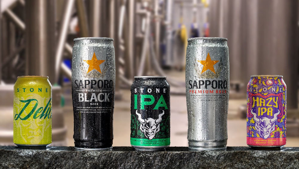 Five cans in a row, three by Stone, two by Sapporo (Photo: courtesy of Stone Brewing)