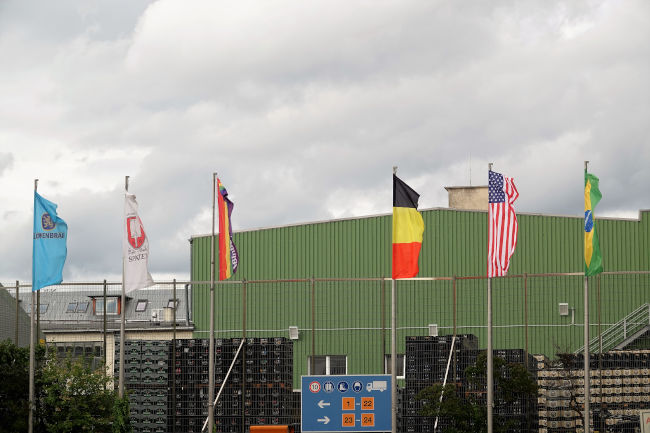 Flags flying outside AB-InBev’s Munich brewery during Octoberfest (Photo: BRAUWELT)