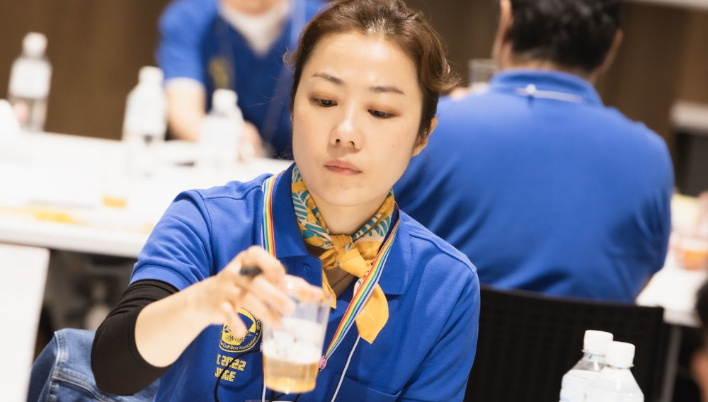 Asian Woman judging beer (Source: Brewers Association)
