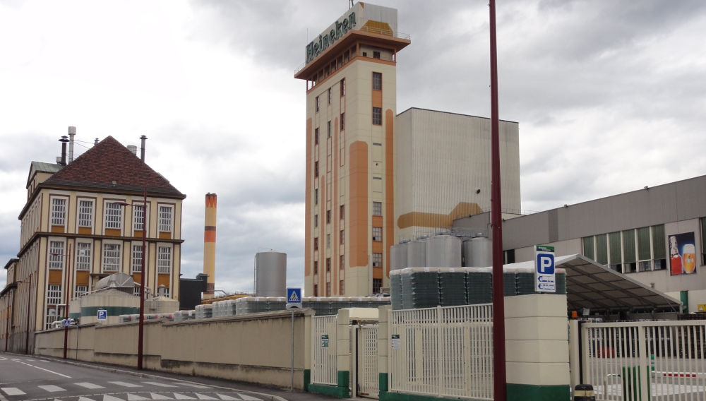 Outside view of the Heineken brewery Schiltigheim (Photo: Ralph Hammann - Wikimedia Commons, https://commons.wikimedia.org/wiki/File:Heineken_Brewery_Schiltigheim.jpg, „Heineken Brewery Schiltigheim“, https://creativecommons.org/licenses/by-sa/4.0/legalcode)