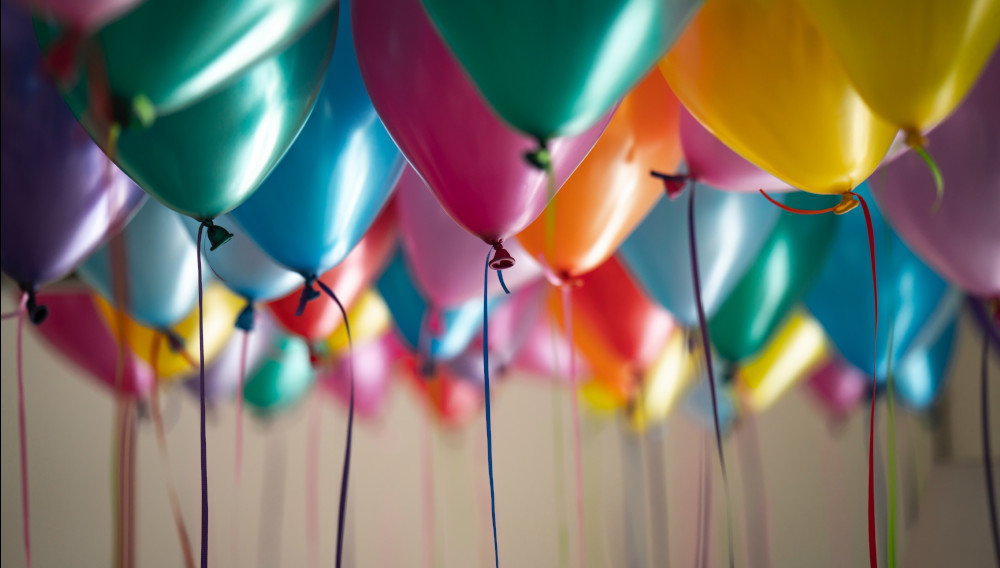 balloons (Photo: Adi Goldstein on Unsplash)