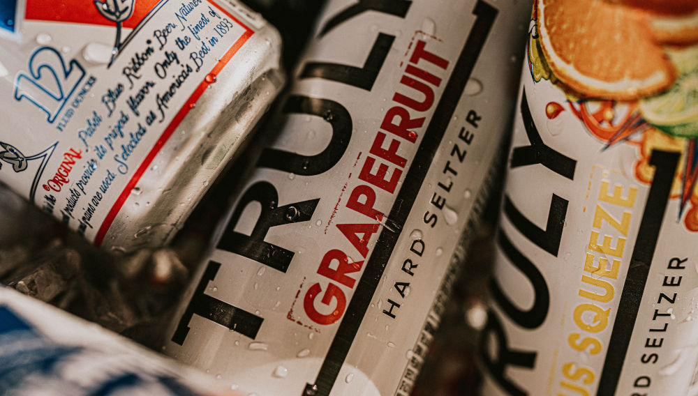 cans of hard seltzer (photo: Camden & Hailey George on Unsplash)