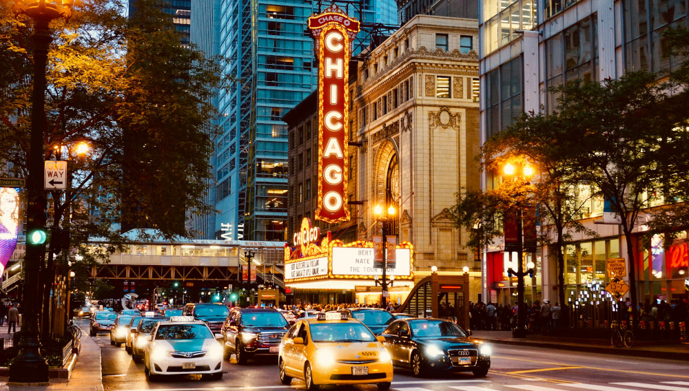 Street with cars in Chicago (Photo: Aveedibya Dey on Unsplash)