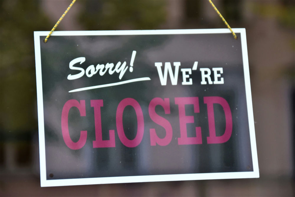  Sign in a window, saying, “Sorry! We’re closed” (Photo by Waldemar on Unsplash)