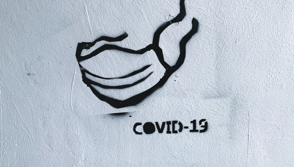 Covid-19 graffiti (Photo: Adam Niescioruk on Unsplash)
