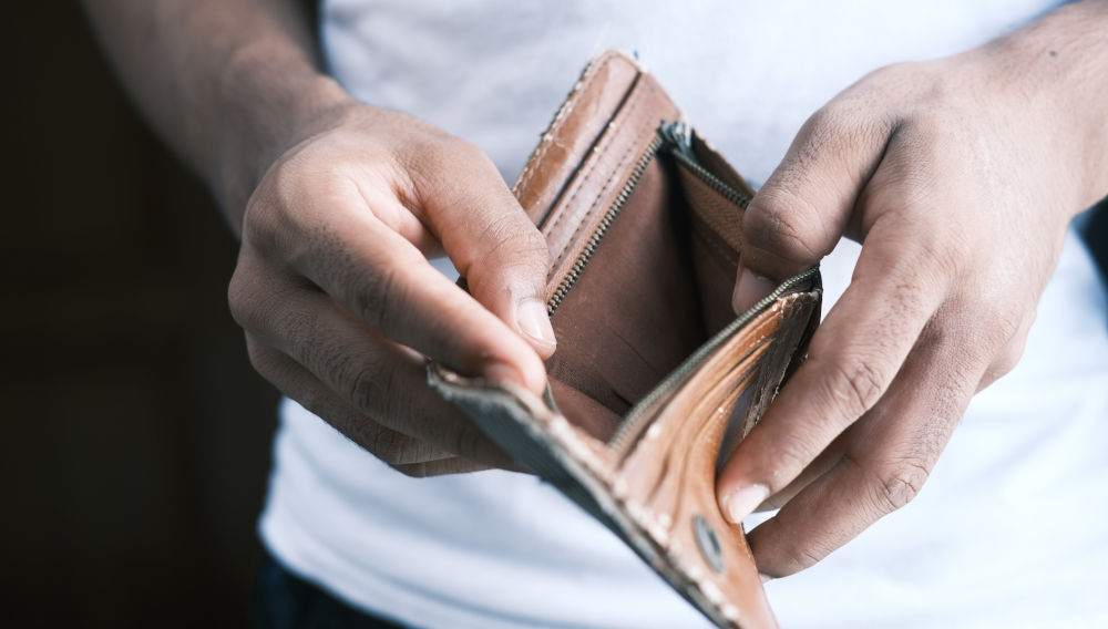 Empty wallet (Photo by Towfiqu Barbhuiya on Unsplash)