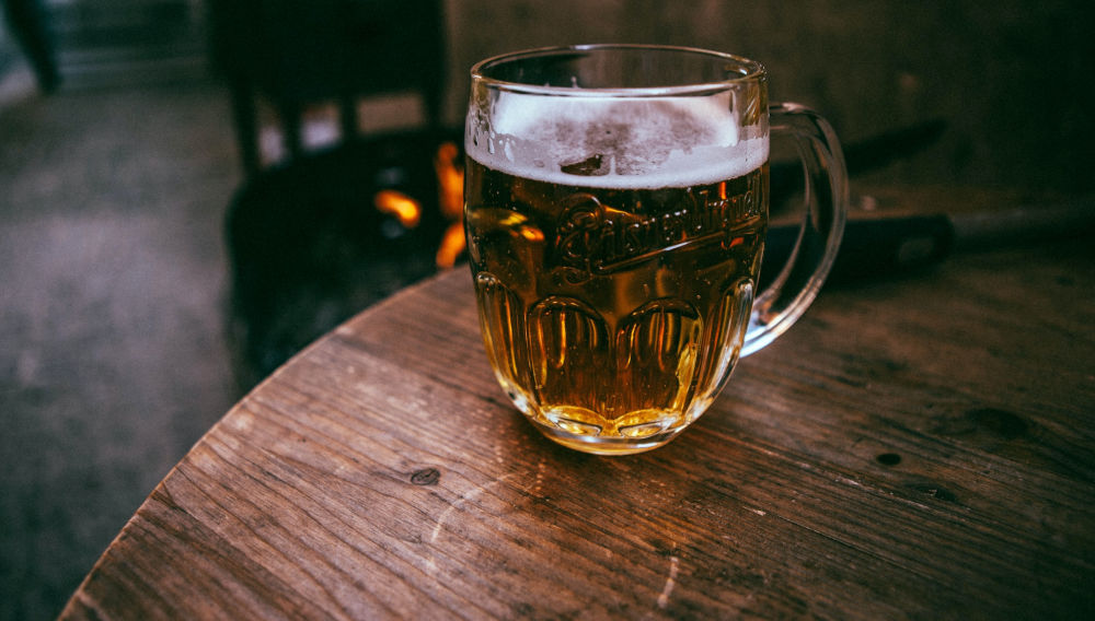 Glass filled with beer (Photo: Evgeniy Smersh on Unsplash)