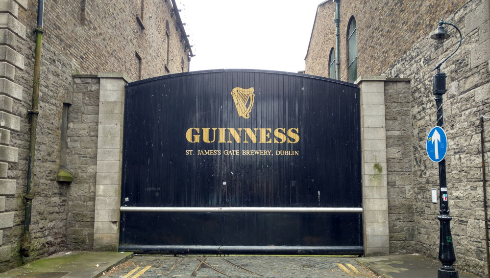 Gate at Guinness Brewery (Photo by Andrew Meßner on Unsplash)