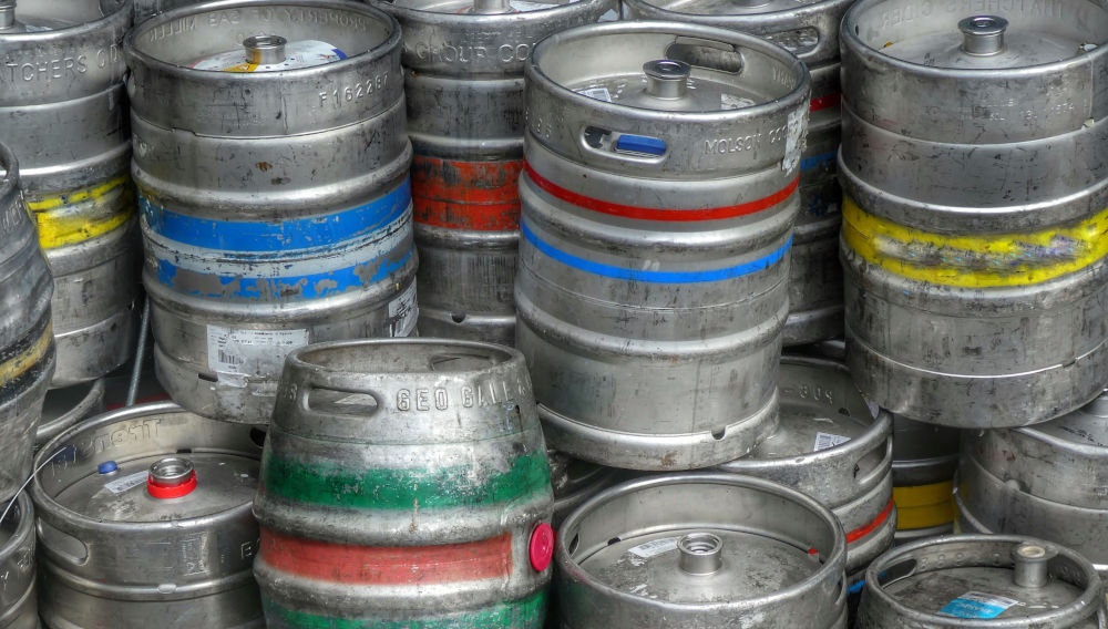 Empty beer kegs (Photo: Belinda Fewings on Unsplash)