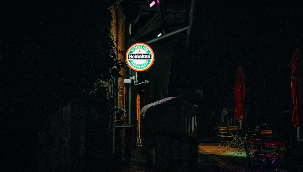 Heineken sign on a building (photo: Samuel Svec on Unsplash)