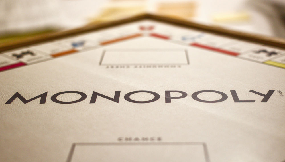 Letters saying “Monopoly” (Photo: Joshua Hoehne on Unsplash)