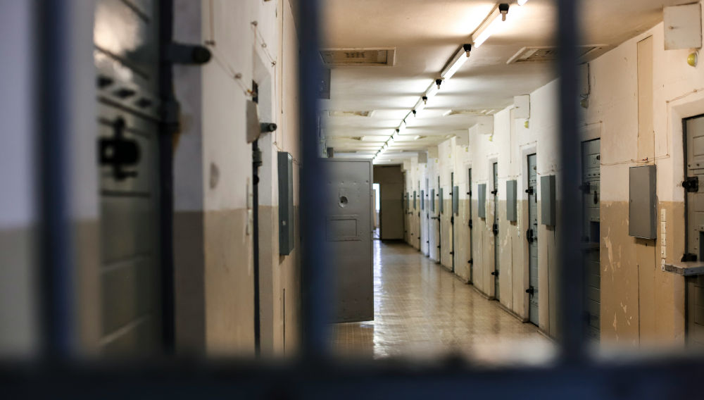 Long corridor with closed doors (Photo: Matthew Ansley on Unsplash)