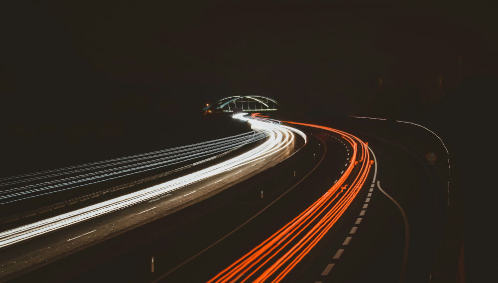 Time-lapse photography of a street at night (Photo: Stephan Seeber on Unsplash)