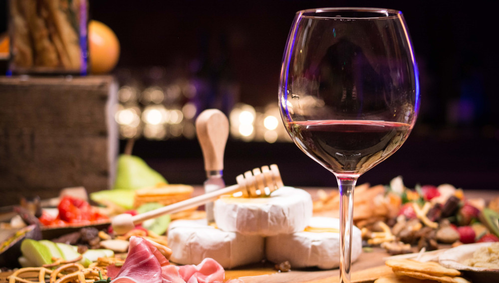 Wine and cheese (Photo: Lana Abie on Unsplash)