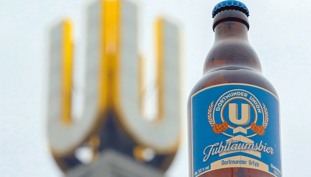 Namensgebend für die Bierspezialität ist das vergoldete „U“ auf dem Kellerhochhaus der ehemaligen Dortmunder Union Brauerei