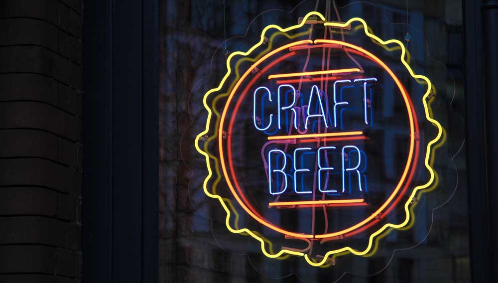 Illuminated craft beer plate (Photo: Tom Quandt on Unsplash)