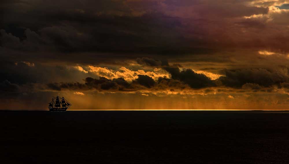 Segelschiff am Horizont (Foto: cocoparisienne, Pixabay)