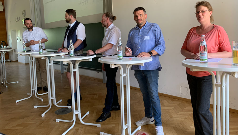 Roman Werner, Rene Jakobsen, Andreas Kenter, Christian Holzner und Mirjam Haensel bei der Podiumsdiskussion