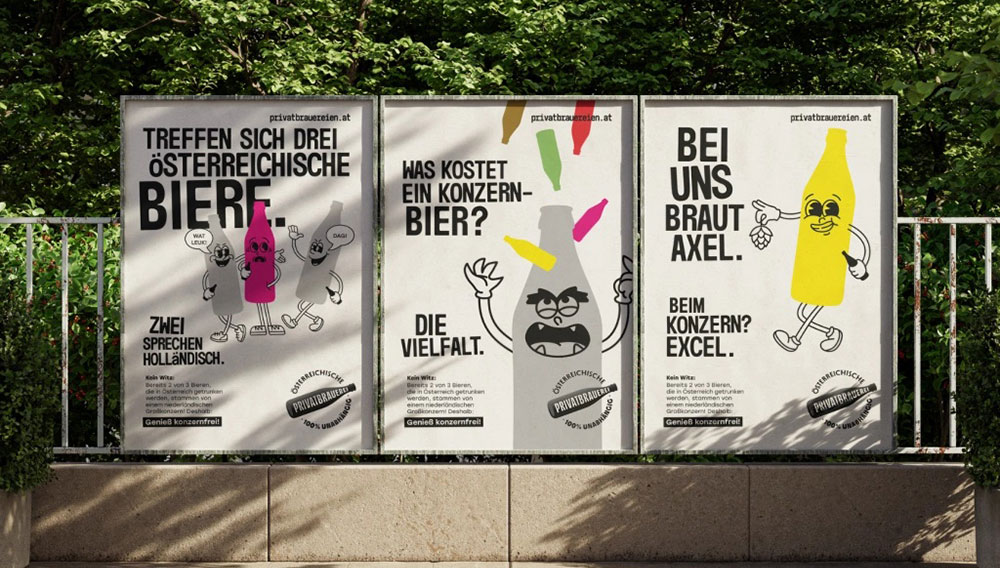 Drei Werbeplakate sind an einem Geländer am Straßenrand befestigt; der Hintergrund ist stets weiß mit schwarzer Schrift, darauf sind graue, rosa und gelbe, vermenschlichte Bierflaschen in verschiedenen Posen gezeichnet (Foto: Courtesy of Wine+Partners)