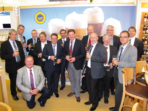 A toast to the new EBC administration ? The EBC Executive Committee on the stand of the Bavarian Brewers Association at Brau Beviale: (7th from right) C. von der Heide, (6th from left) Dr. S. Lustig, (7th from left) Dr. S. Kreisz. Picture: EBC